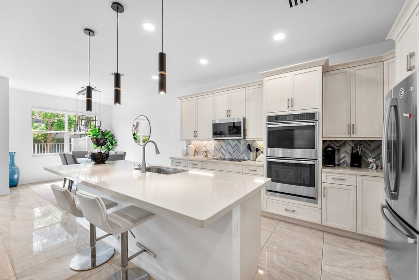 Experience effortless East Boca living in this meticulously - photo 9