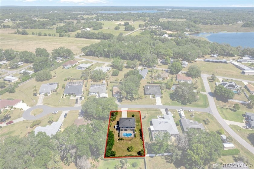 Nestled on a quiet cul-de-sac, this original-owner, custom-built - photo 3