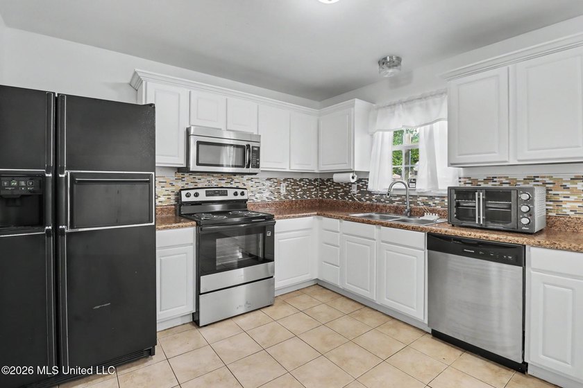 Pristine and move-in ready in the heart of Long Beach! Pride of - photo 8
