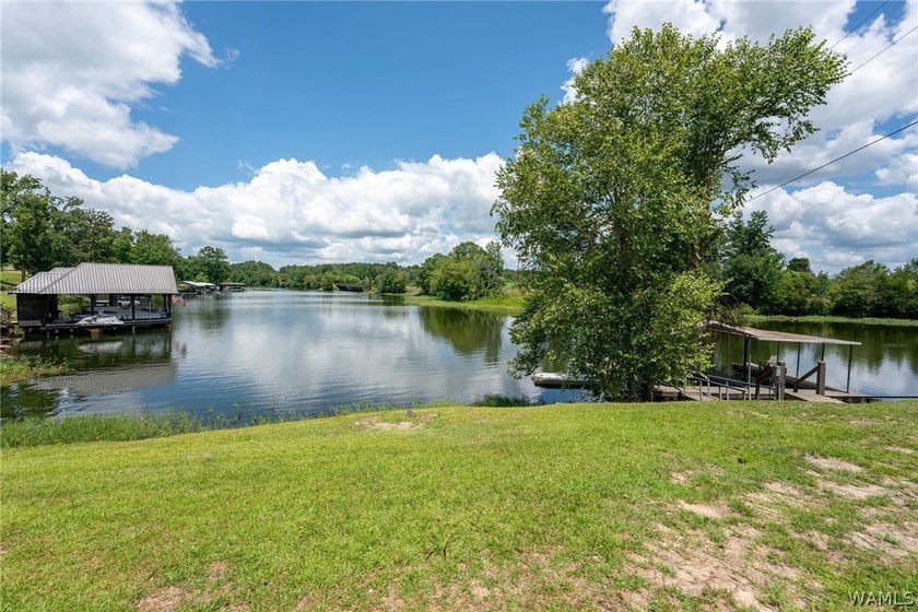 Enjoy the ultimate lakefront lifestyle, fully furnished and - photo 34