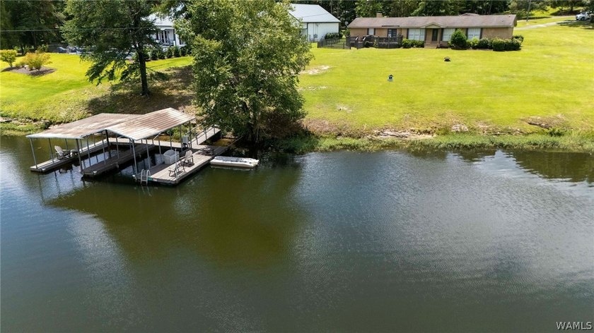 Enjoy the ultimate lakefront lifestyle, fully furnished and - photo 35