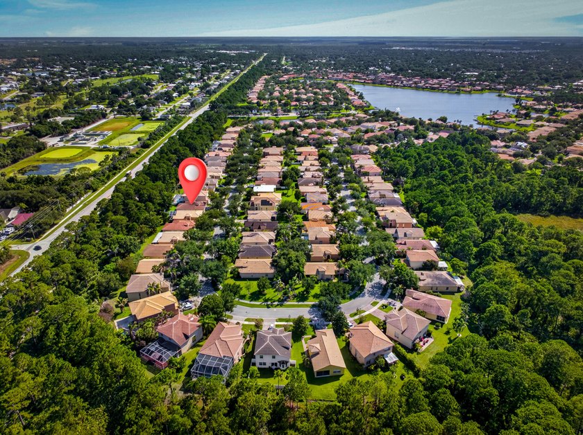 This 3BD/2BA CBS home is located in the gated community of - photo 2