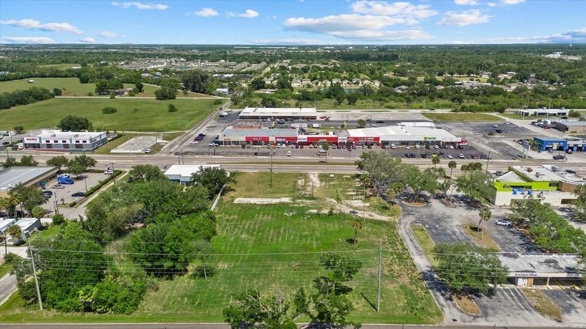 610 N US Hwy 41 lot is 104 feet by 173 ft deep; North Lot on 1st - photo 2