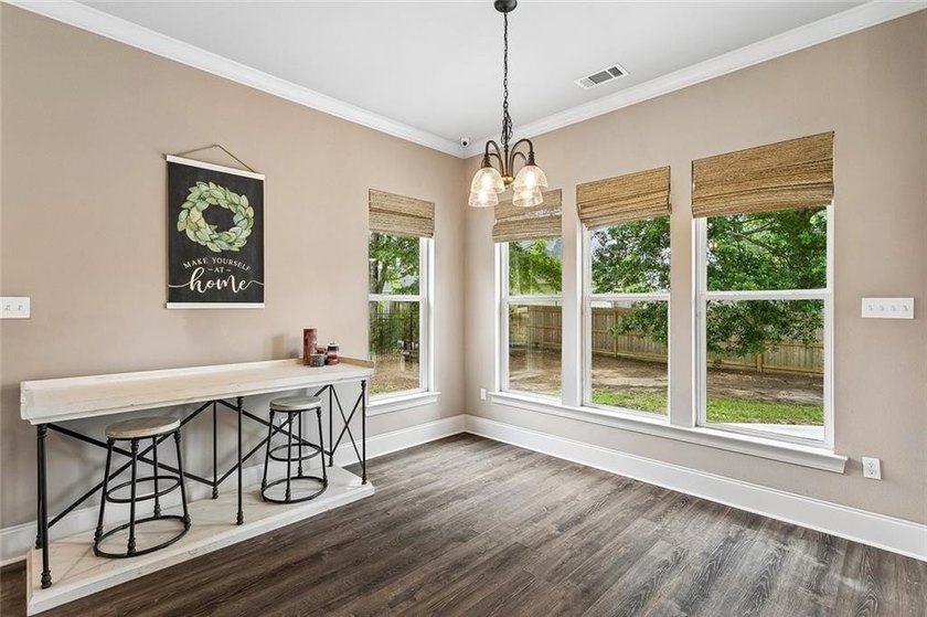 Situated in The Landings subdivision, this all-brick - photo 4
