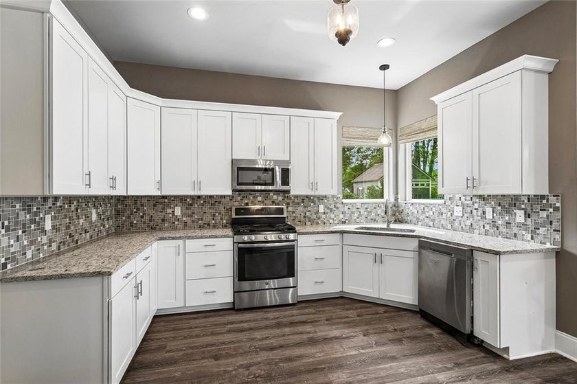 Situated in The Landings subdivision, this all-brick - photo 6