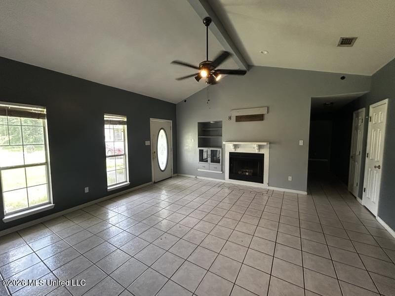 This property features 3 bedrooms and 2 bathrooms. Covered back - photo 3