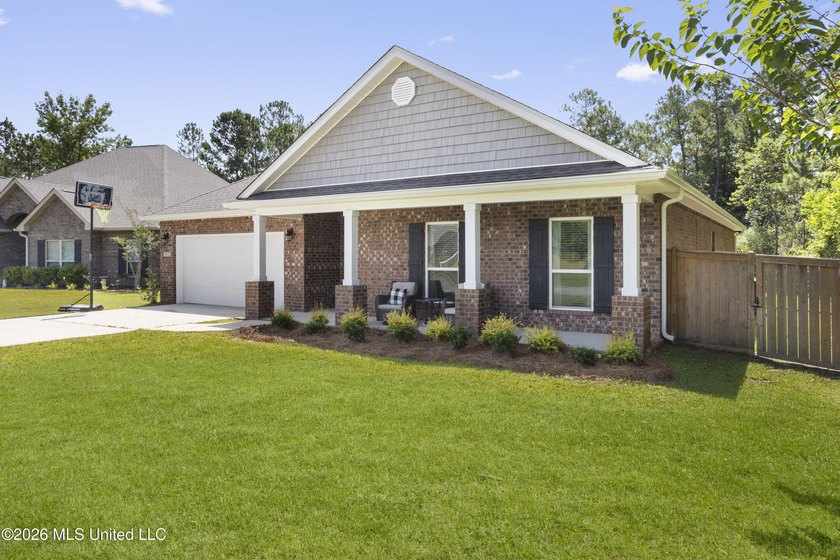Welcome home to this beautifully maintained 4-bedroom, 3-bath - photo 2