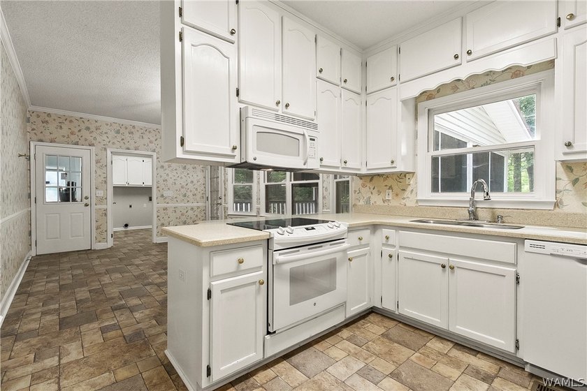 This beautifully maintained property offers privacy, recreation - photo 13