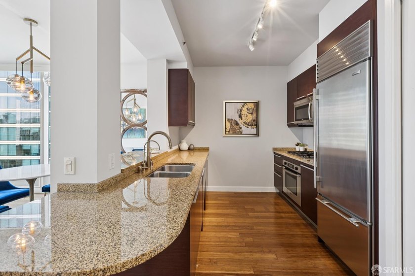 Back on market, One Rincon Hill where iconic views, exquisite - photo 13