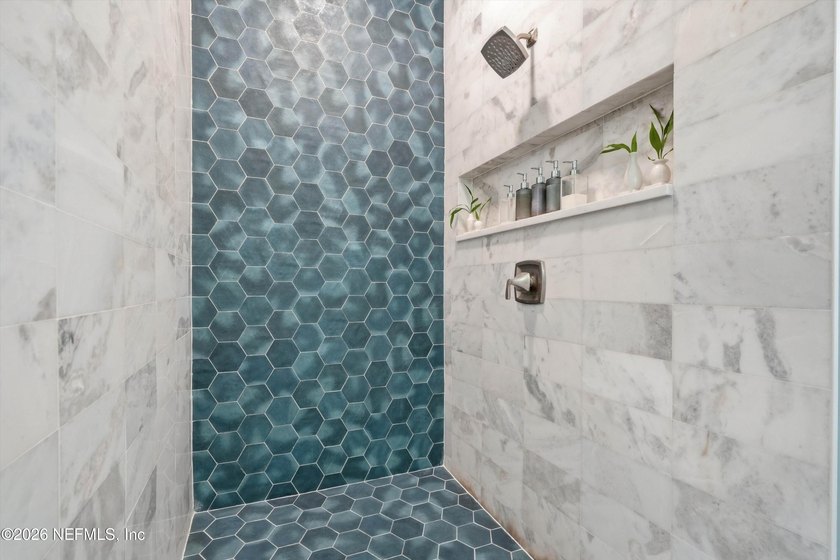 Luxury meets everyday livability in this custom PVB home just - photo 9