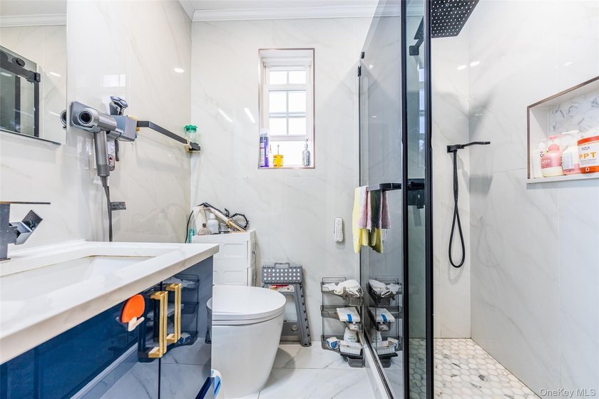 Step into this lovely 2/3-bedroom unit on the second floor of - photo 3