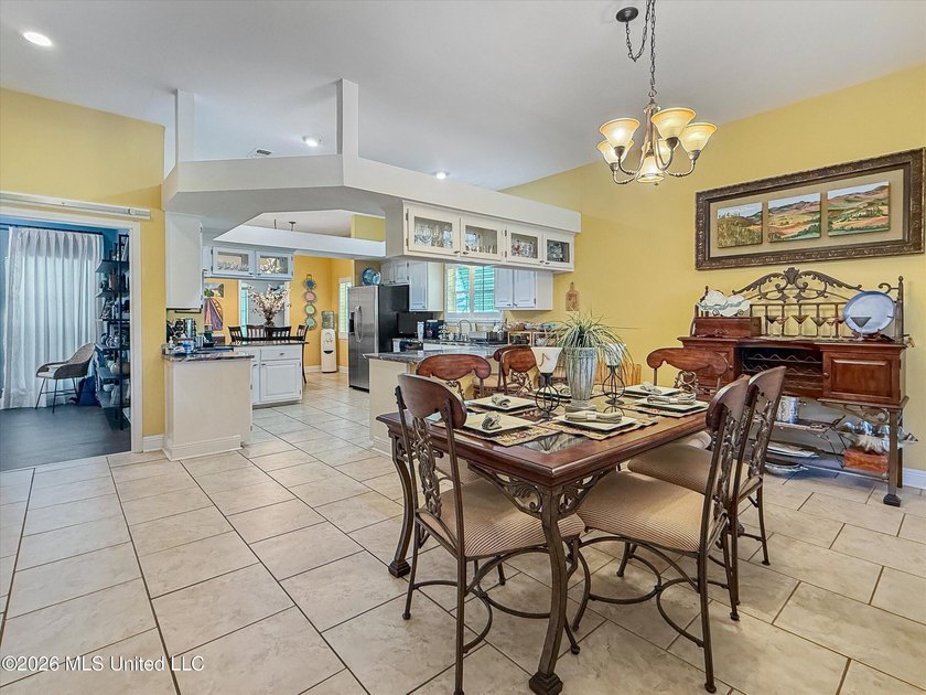 Welcome to this Riverfront gem on the Tchoutacabouffa! 3 Beds | - photo 4