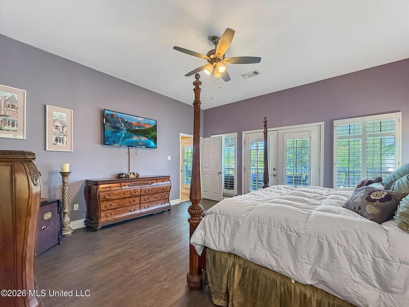 Welcome to this Riverfront gem on the Tchoutacabouffa! 3 Beds | - photo 6