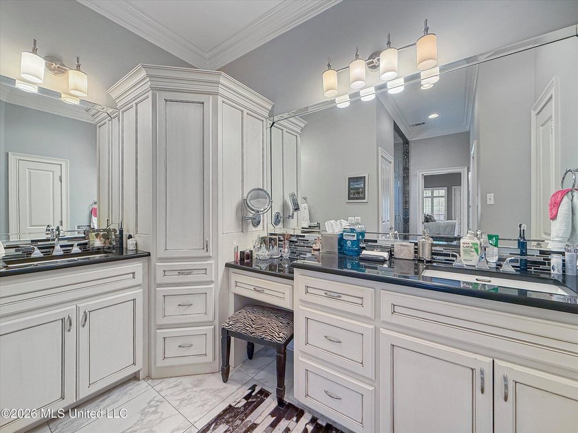 Welcome to this Riverfront gem on the Tchoutacabouffa! 3 Beds | - photo 8