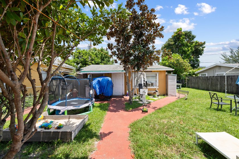 Located on an expansive lot, almost 14,000 sq ft, 4373 Venus Ave - photo 12