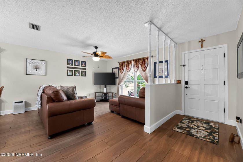 Welcome home to this beautifully maintained property featuring a - photo 5