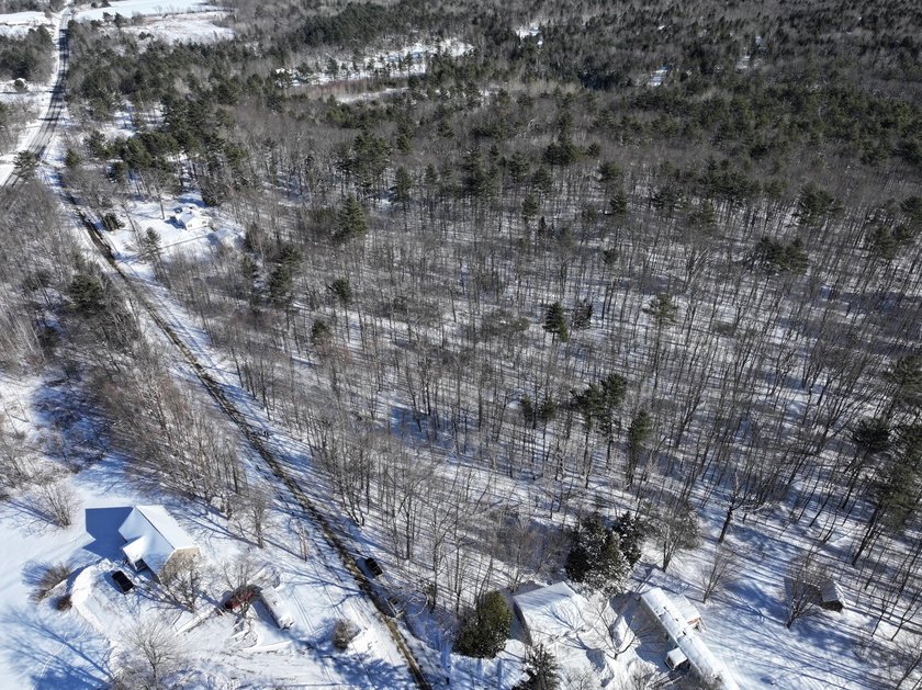 Set in a peaceful rural setting, this 1.6-acre wooded parcel - photo 10