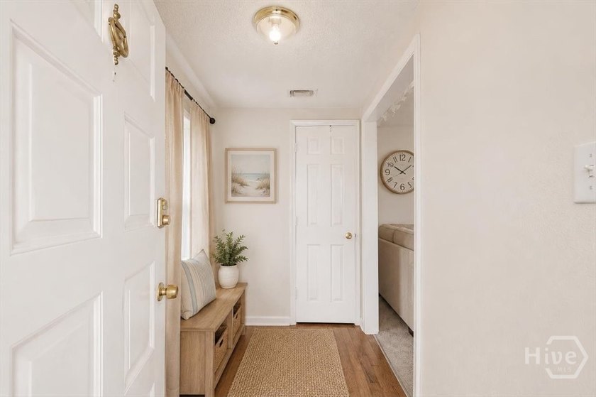 This all brick 3-bedroom, 1-bath all-brick home presents an - photo 3