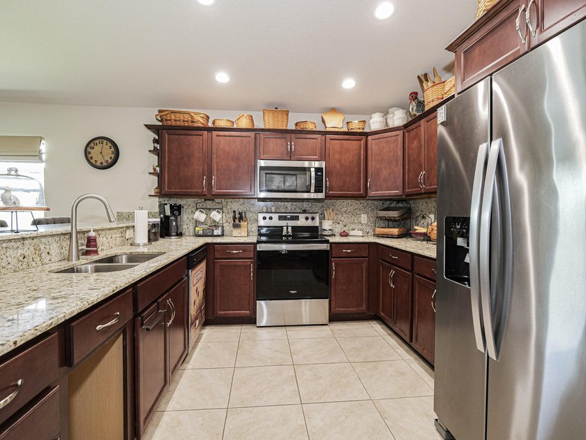 Located in the desirable Spanish Lakes community, this - photo 12