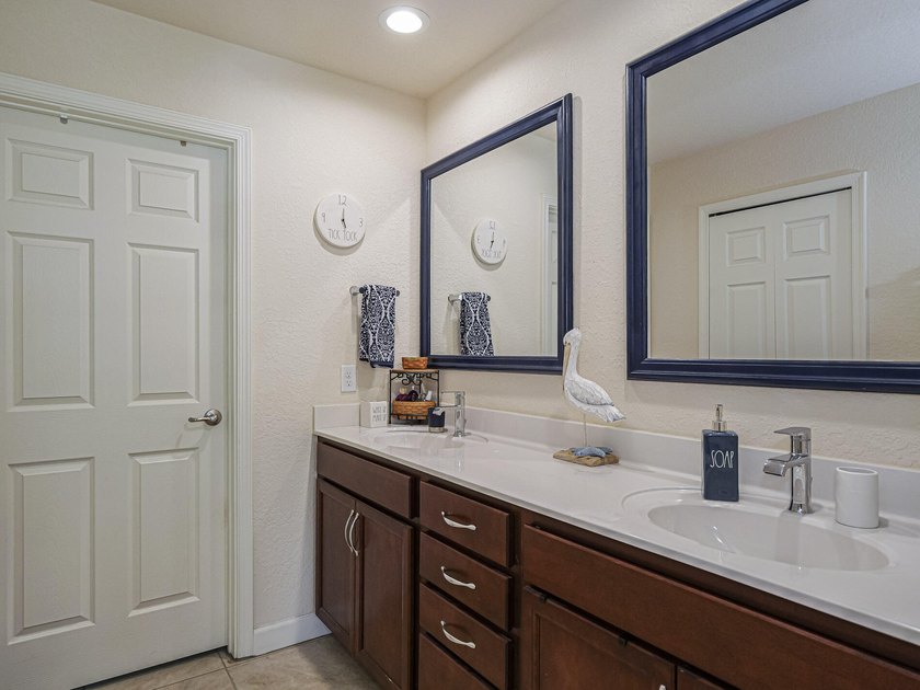 Located in the desirable Spanish Lakes community, this - photo 17