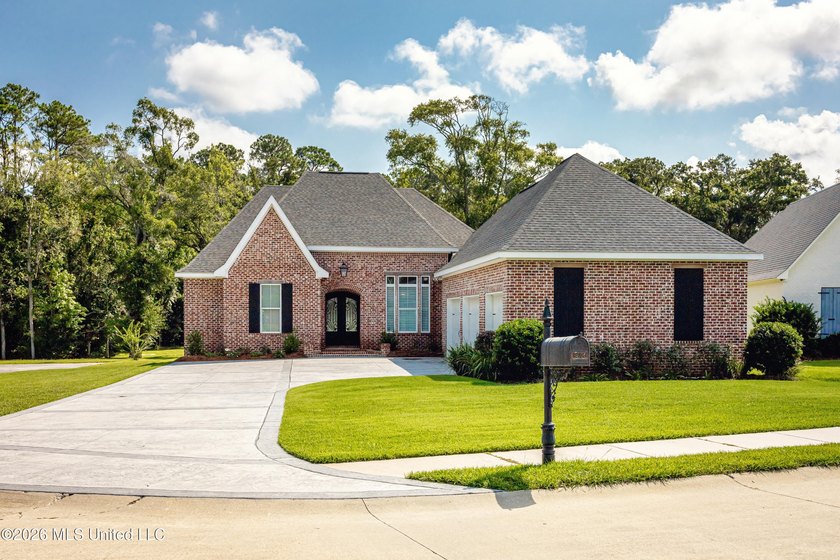 Welcome to this stunning custom-built home in the highly - photo 2