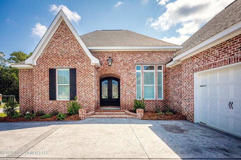 Welcome to this stunning custom-built home in the highly - photo 6