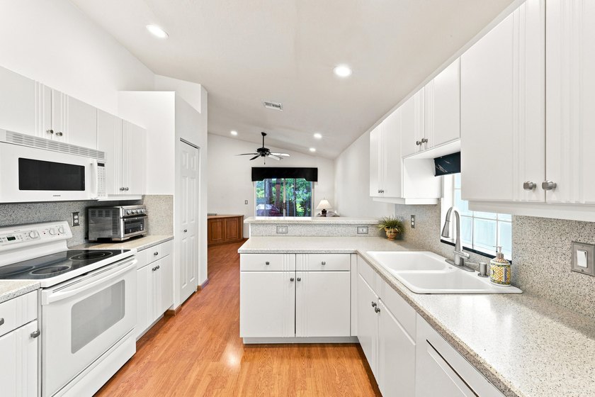 Beautifully maintained 3-bedroom, 2-bath home featuring a 2-car - photo 8
