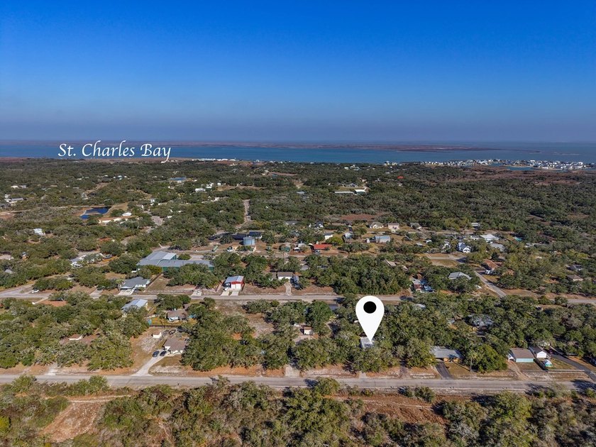Tucked beneath the shade of towering coastal live oaks, this - photo 9