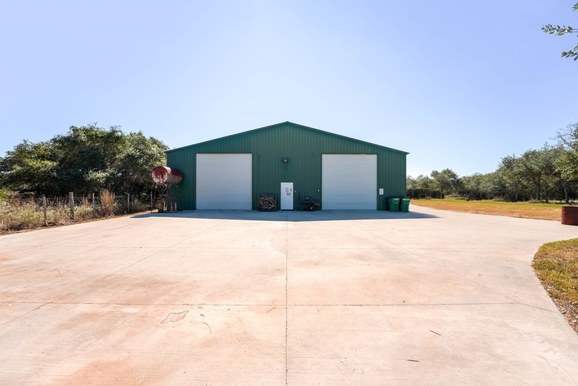 PRICE IMPROVEMENT! 7.8 ACRES + PRIVATE LAKE + COMMERCIAL SHOP + - photo 3