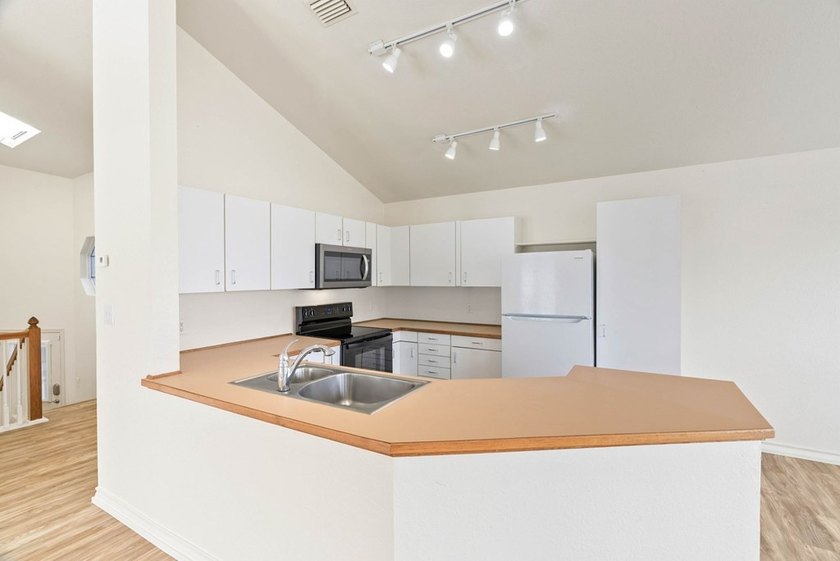 Experience carefree coastal living at Oak Bay Club Condominiums - photo 11