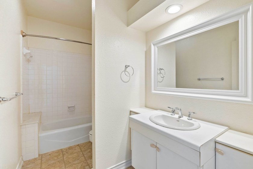Experience carefree coastal living at Oak Bay Club Condominiums - photo 27