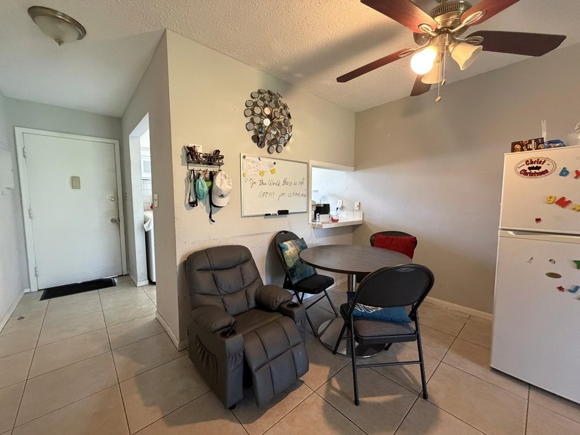 Ground-floor convenience meets low-maintenance living in this - photo 3