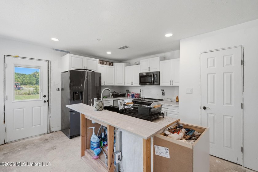 Bring your vision and transform this 3BR/2BA farmhouse-style - photo 7