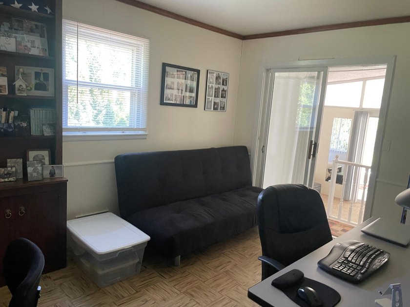 This inviting 4-bedroom, 2 bath home offers a bright layout with - photo 12