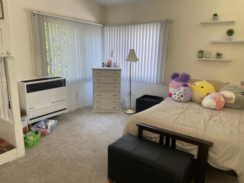 This inviting 4-bedroom, 2 bath home offers a bright layout with - photo 13