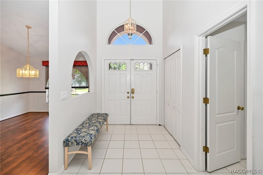 Welcome to this light and bright three-bedroom pool home tucked - photo 4