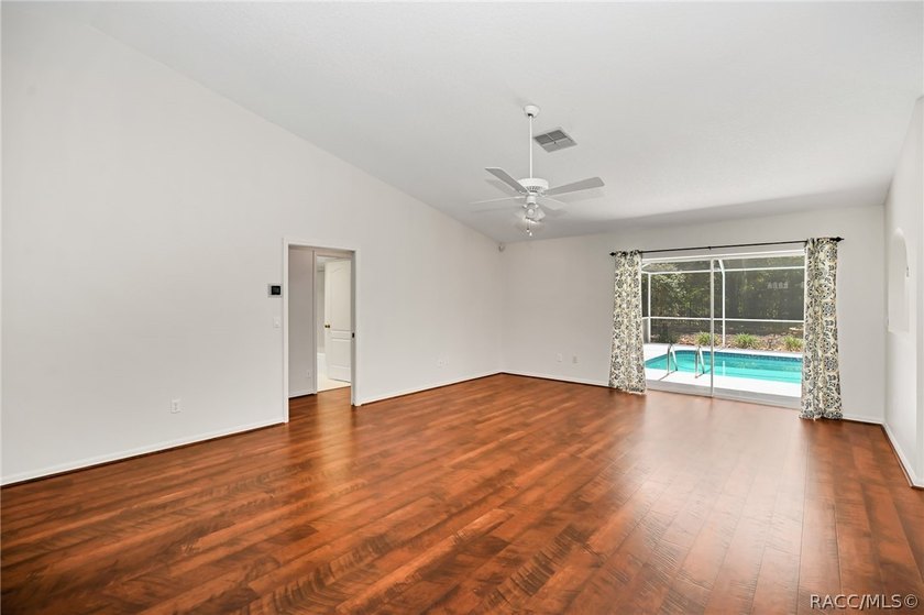 Welcome to this light and bright three-bedroom pool home tucked - photo 5