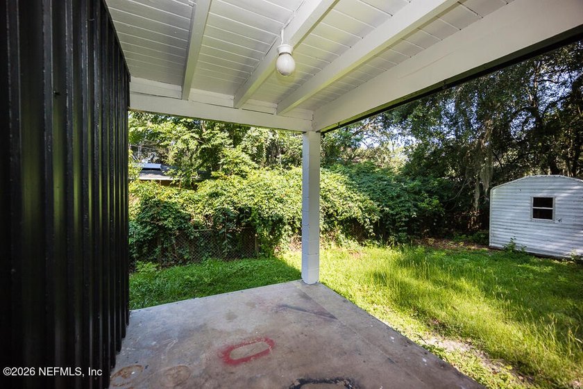 Cute house sits up high from street. Large screened porch, 1 car - photo 22