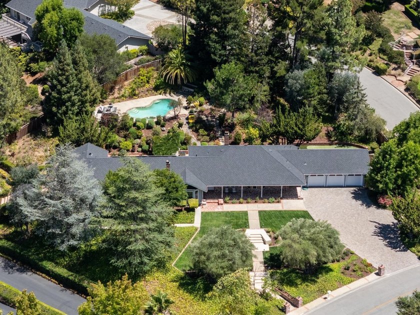 Situated on a pristine, park-like 0.92-acre lot, this stunning 3 - photo 2