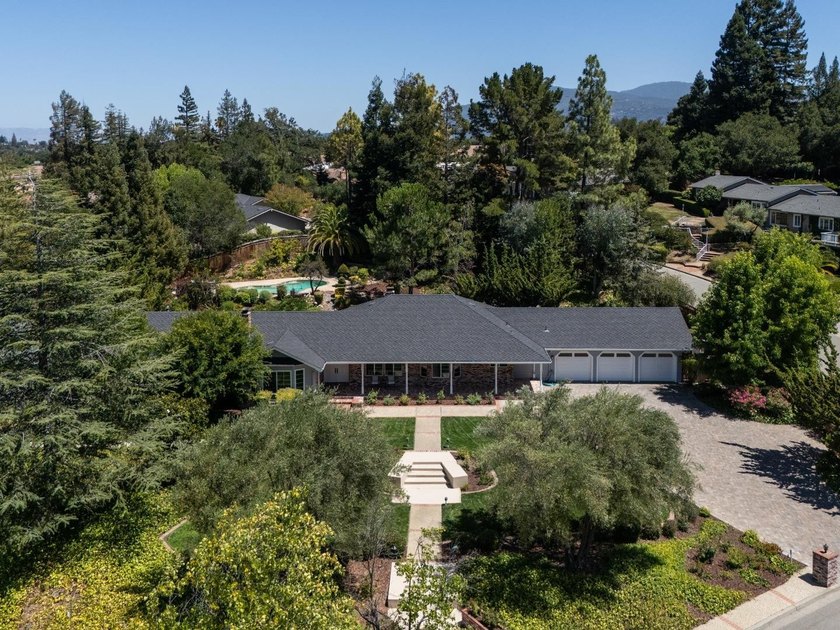 Situated on a pristine, park-like 0.92-acre lot, this stunning 3 - photo 4