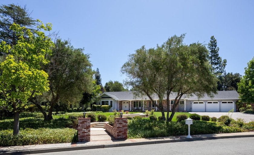 Situated on a pristine, park-like 0.92-acre lot, this stunning 3 - photo 6