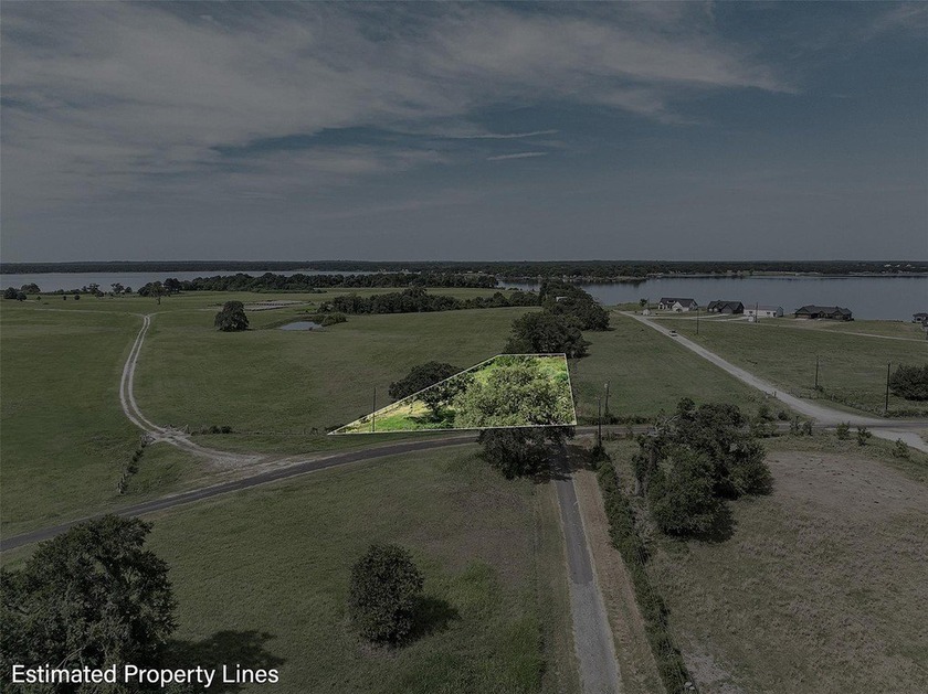 Beautiful .718 acre lot over looking Lake Limestonee build your - photo 5