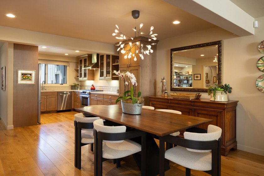 This exquisitely updated townhome enjoys privacy, sunshine, and - photo 6