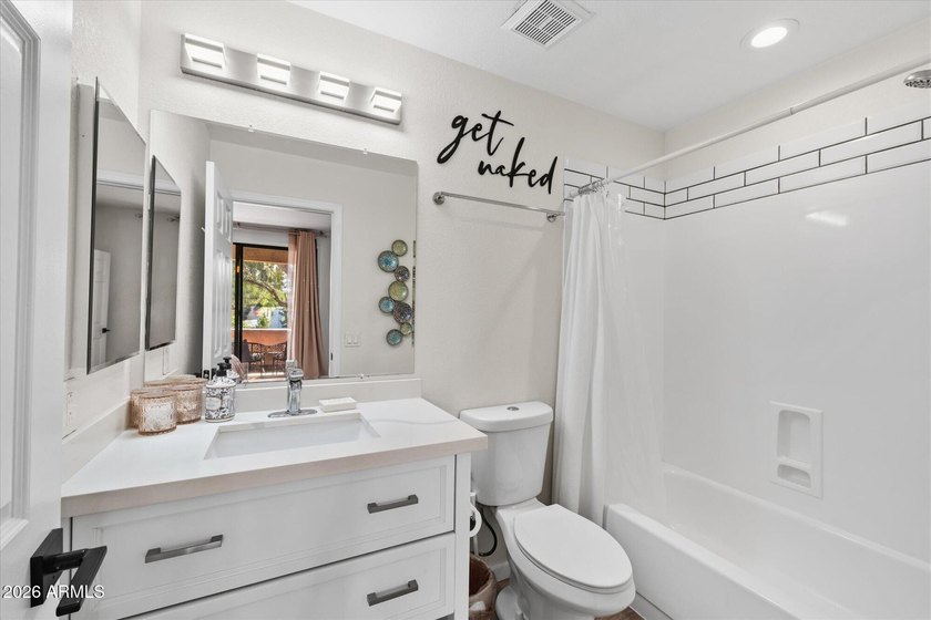 Thoughtfully renovated 2-bed, 2-bath condo in the guard-gated - photo 10