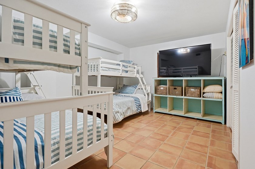 Welcome to this beautiful Key Allegro canal front home. Located - photo 9