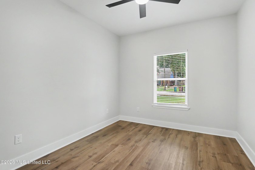 Welcome to effortless coastal living in this beautifully crafted - photo 8