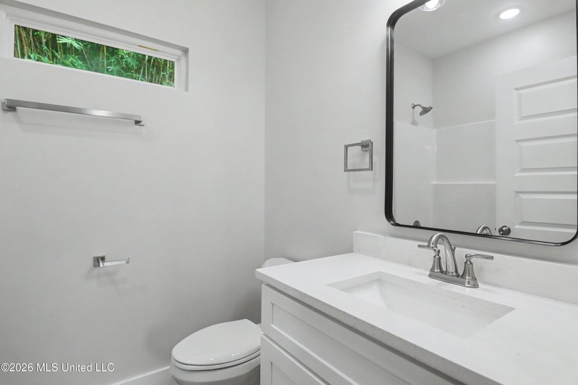Welcome to effortless coastal living in this beautifully crafted - photo 10