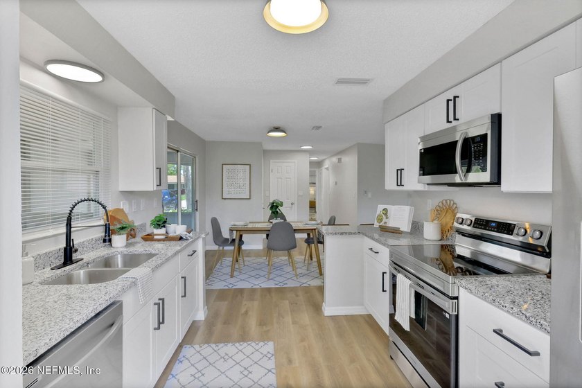 We invite you to come see this incredible home with modern - photo 3