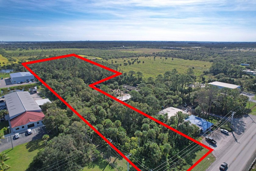 This prime 7-acre lot is located in the heart of a rapidly - photo 2