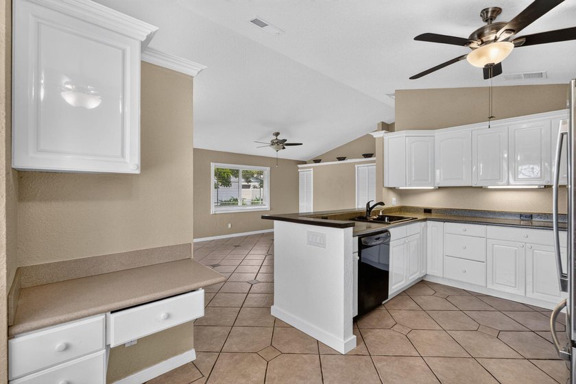 Welcome to this charming 3-bedroom, 2-bathroom CBS home situated - photo 4